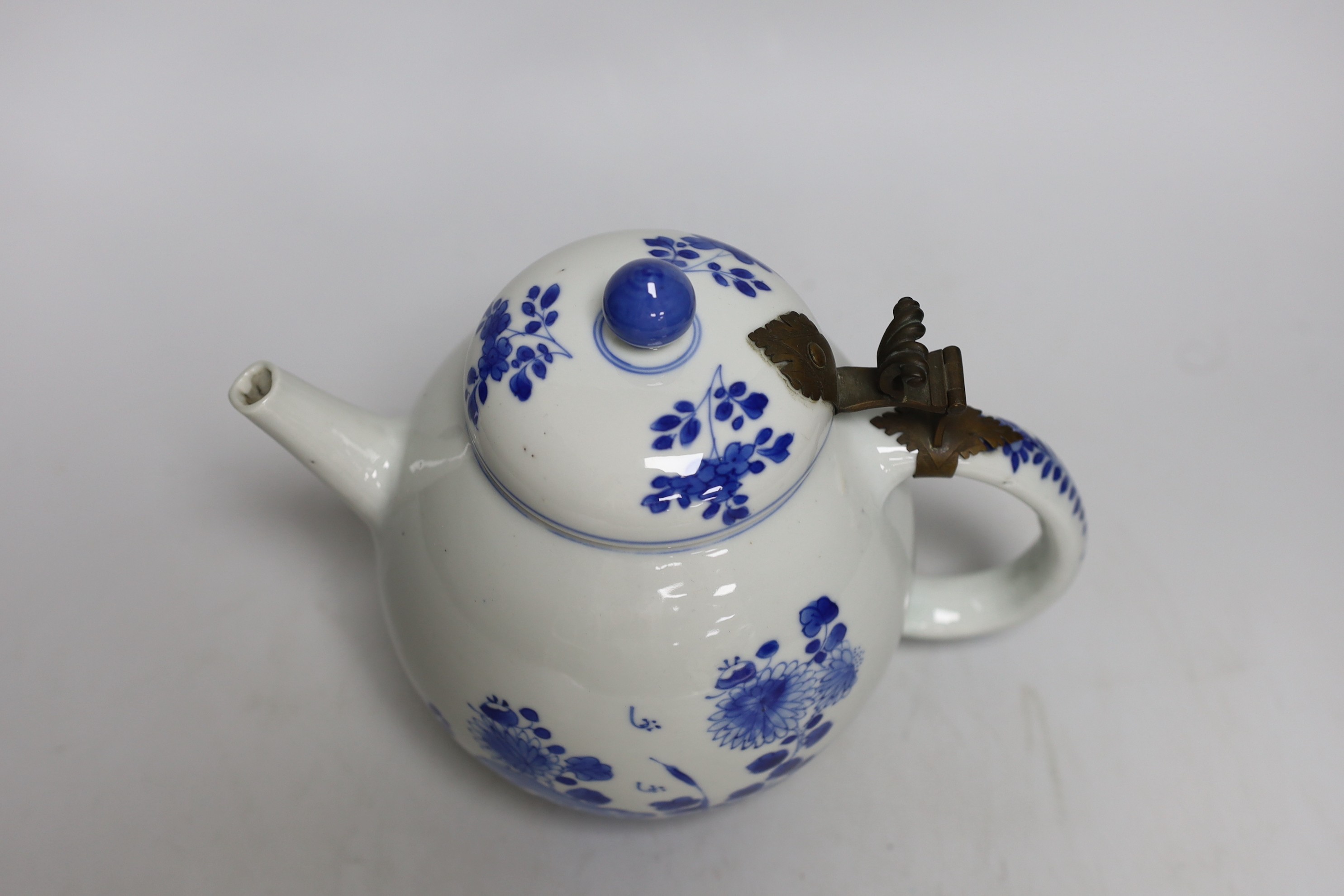 A Chinese blue and white tea or wine pot, Kangxi period, 17cms high